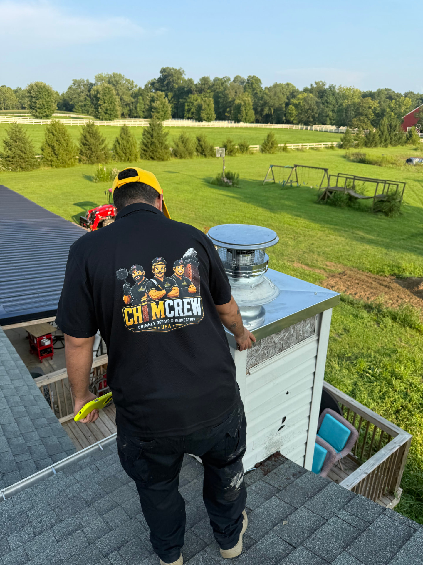 ChimCrew technician servicing a chimney cap and crown
